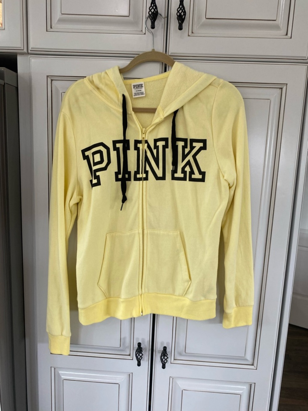 PINK Victoria's Secret Pale Yellow Sweatshirt with Black Logo Tag